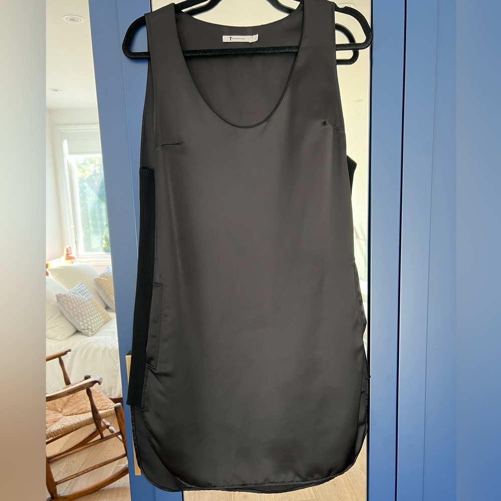 T by Alexander Wang black dress. Size 4 woman. Fits large. Loose fit. Pockets.